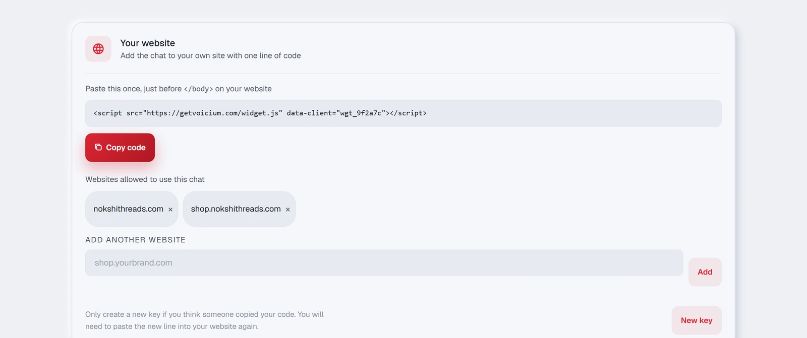 The widget once it is created: your line of code, the websites allowed to use it, and the New key button.